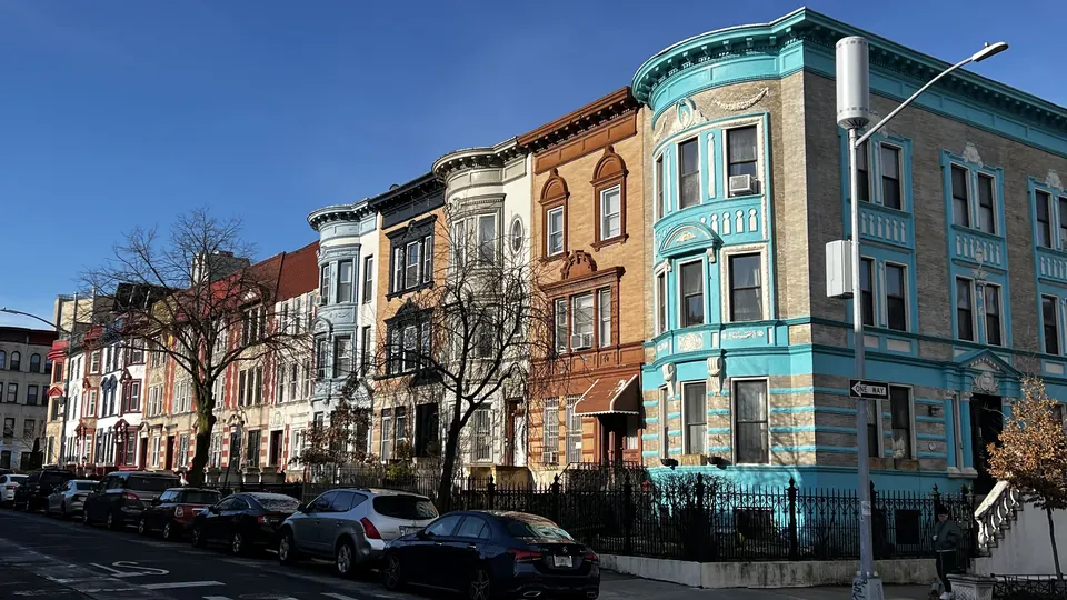 The corner building at 832 Dean Street seen from the intersection.